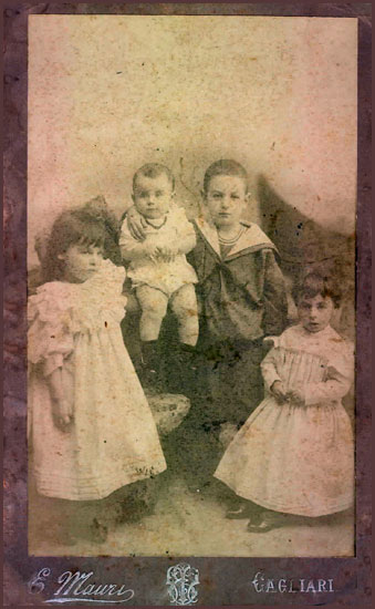 Emanuela, Paola, Giovanni e Antonio “Toniolo” Amat Cartolari